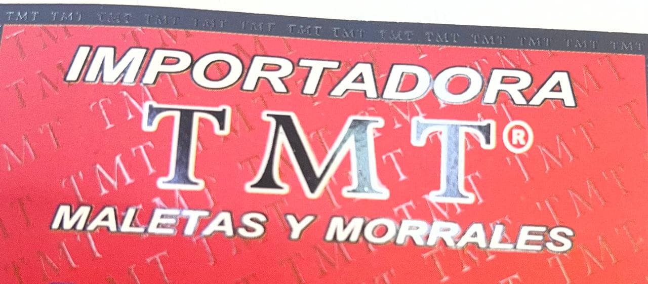 Logo de importadora Tmt
